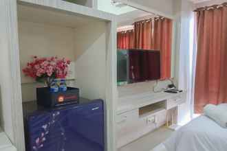 Bedroom 4 Relax and Warm Studio at Vida View Makassar Apartment By Travelio