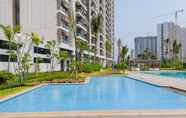 Kolam Renang 7 Tidy and Elegant 2BR at Sky House BSD Apartment By Travelio