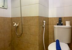 In-room Bathroom 6 Comfort and Tidy 2BR Apartment at Green Pramuka City By Travelio