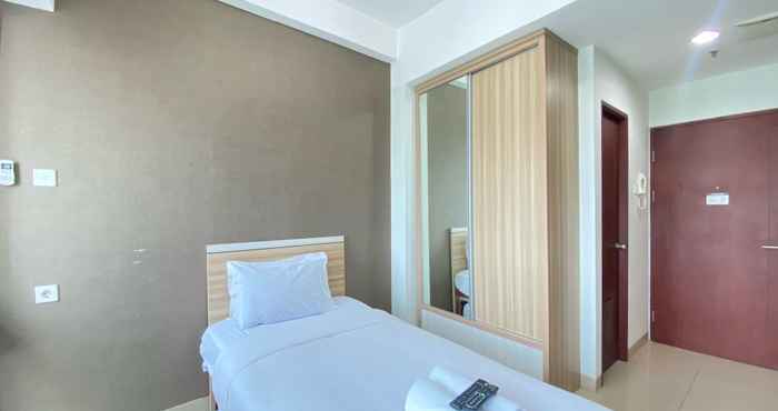 Bedroom Cozy and Tidy Studio at Taman Melati Jatinangor Apartment By Travelio