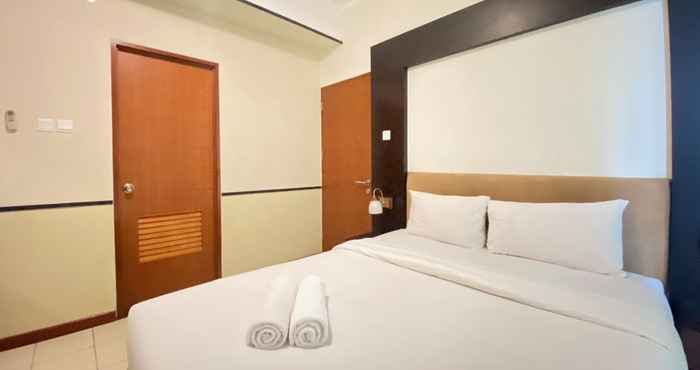 Kamar Tidur Spacious Bohemian 2BR Apartment at Marbella Suites Dago Pakar Bandung By Travelio
