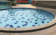 Swimming Pool 6 Best Deal 2BR at Cinere Bellevue Suites Apartment By Travelio
