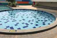 Swimming Pool Best Deal 2BR at Cinere Bellevue Suites Apartment By Travelio