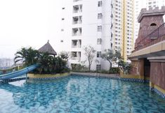 Swimming Pool 3 Comfy and Comfort 2BR at Great Western Resort Apartment By Travelio