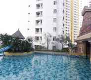 Swimming Pool 3 Comfy and Comfort 2BR at Great Western Resort Apartment By Travelio