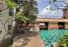 Swimming Pool 7 Comfy and Comfort 2BR at Great Western Resort Apartment By Travelio