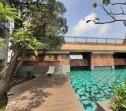 Swimming Pool 7 Comfy and Comfort 2BR at Great Western Resort Apartment By Travelio