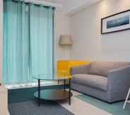 Common Space 4 Comfy and Comfort 2BR at Great Western Resort Apartment By Travelio