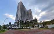 Lobby 6 Comfort and Warm 1BR at Amartha View Apartment By Travelio