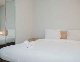 Bedroom 2 Comfy and Elegant Studio Apartment at Bintaro Icon By Travelio