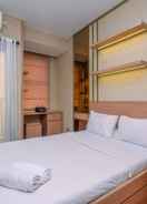 BEDROOM Cozy and Tidy Studio at Transpark Cibubur Apartment By Travelio