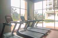 Fitness Center Cozy and Tidy Studio at Transpark Cibubur Apartment By Travelio