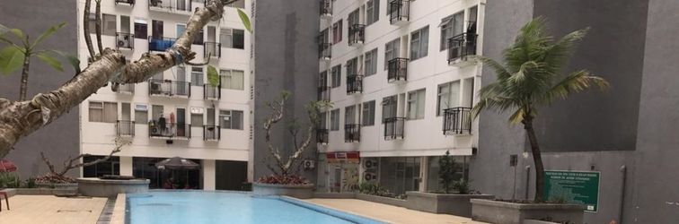 Lobby Homey and Good Living 2BR at Jarrdin Cihampelas Apartment By Travelio