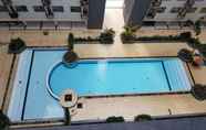 Swimming Pool 6 Homey and Good Living 2BR at Jarrdin Cihampelas Apartment By Travelio