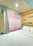 BEDROOM Homey and Good Living 2BR at Jarrdin Cihampelas Apartment By Travelio