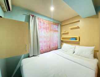 Bedroom 2 Homey and Good Living 2BR at Jarrdin Cihampelas Apartment By Travelio
