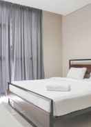 BEDROOM Fancy and Nice 1BR Apartment at Ciputra International By Travelio