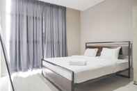 Bedroom Fancy and Nice 1BR Apartment at Ciputra International By Travelio