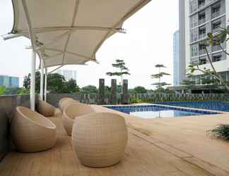 Bangunan 2 Fancy and Nice 1BR Apartment at Ciputra International By Travelio