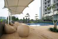 Exterior Fancy and Nice 1BR Apartment at Ciputra International By Travelio