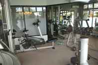 Fitness Center Cozy and Good Furnished 3BR at Grand Setiabudi Apartment By Travelio