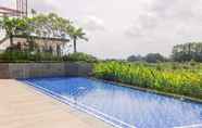 Kolam Renang 6 Comfy and Elegant 1BR at Marigold Nava Park Apartment By Travelio