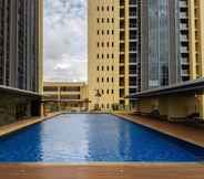 Swimming Pool 7 Cozy and Well Designed 2BR Apartment Branz BSD City By Travelio