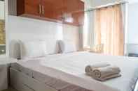 Kamar Tidur Cozy and Compact Studio Apartment at Orchard Supermall Mansion By Travelio