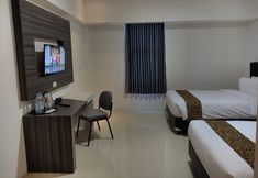 Bedroom 5 Golden Ganesha Hotel Yogyakarta by Ecommerceloka