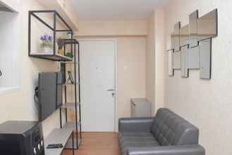 Common Space 4 Tidy and Enjoy Living 1BR Bassura City Apartment By Travelio