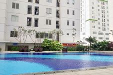 Swimming Pool Comfort and Cozy Stay 2BR at Bassura Apartment By Travelio