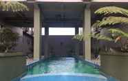 Swimming Pool 7 Homey and Good Studio Furnished at Grand Asia Afrika Apartment By Travelio
