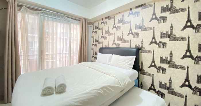 Bedroom Homey and Good Studio Furnished at Grand Asia Afrika Apartment By Travelio