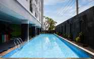 Swimming Pool 5 Relaxing and Calm Studio at Puri Mas Apartment By Travelio