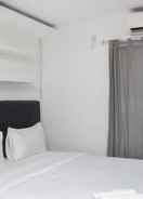 BEDROOM Homey and Comfort Studio at Amethyst Apartment By Travelio