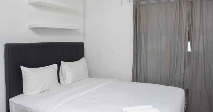 Kamar Tidur Homey and Comfort Studio at Amethyst Apartment By Travelio