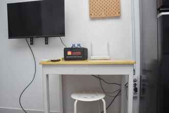 Ruang untuk Umum 4 Homey and Comfort Studio at Amethyst Apartment By Travelio