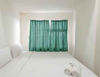 Bedroom 2 Homey and Nice 2BR at Vida View Makasar Apartment By Travelio