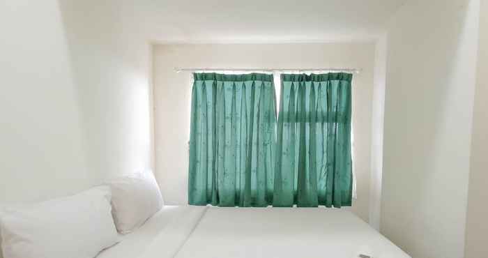 ห้องนอน Homey and Nice 2BR at Vida View Makasar Apartment By Travelio