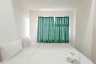 ห้องนอน Homey and Nice 2BR at Vida View Makasar Apartment By Travelio