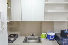 公共空間 Homey and Nice 2BR at Vida View Makasar Apartment By Travelio