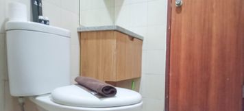 In-room Bathroom 5 Homey and Nice 2BR at Vida View Makasar Apartment By Travelio