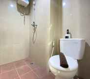 In-room Bathroom 4 Cozy and Warm Studio Corner Room at Taman Melati Jatinangor Apartment By Travelio
