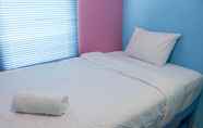 Bedroom 2 Cozy and Comfort 2BR at Springlake Summarecon Bekasi Apartment By Travelio