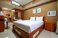 Kamar Tidur Well Equipped & Good Studio at The Oasis Apartment Cikarang By Travelio