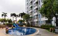 Swimming Pool 5 Spacious and Tidy Studio Apartment Access to Pakuwon Mall at Tanglin Supermall Mansion By Travelio