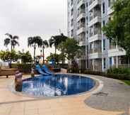 Swimming Pool 5 Spacious and Tidy Studio Apartment Access to Pakuwon Mall at Tanglin Supermall Mansion By Travelio