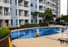 Swimming Pool 7 Spacious and Tidy Studio Apartment Access to Pakuwon Mall at Tanglin Supermall Mansion By Travelio