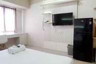 Ruang Umum Spacious and Tidy Studio Apartment Access to Pakuwon Mall at Tanglin Supermall Mansion By Travelio