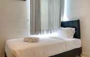 Bilik Tidur 2 Cozy and Warm 2BR at Cinere Bellevue Suites Apartment By Travelio